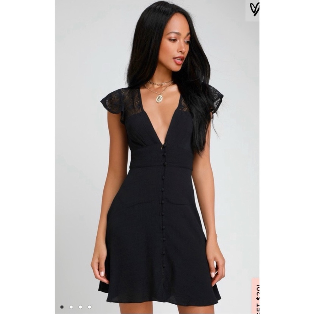 Free People black dress with lace detail.
